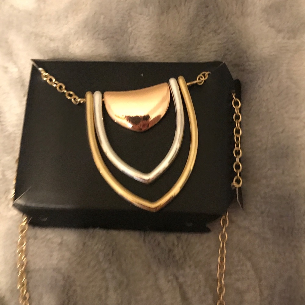 New silver, gold and rose gold toned necklace